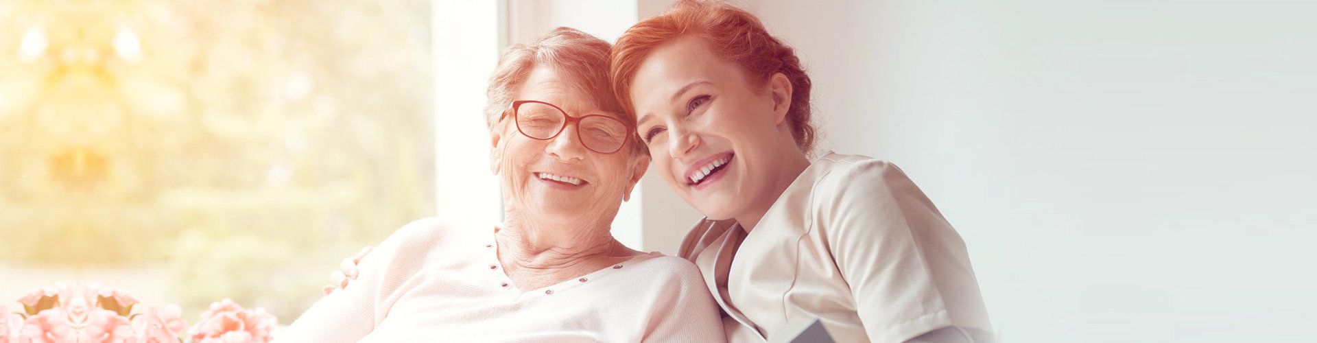 woman and old woman smilling