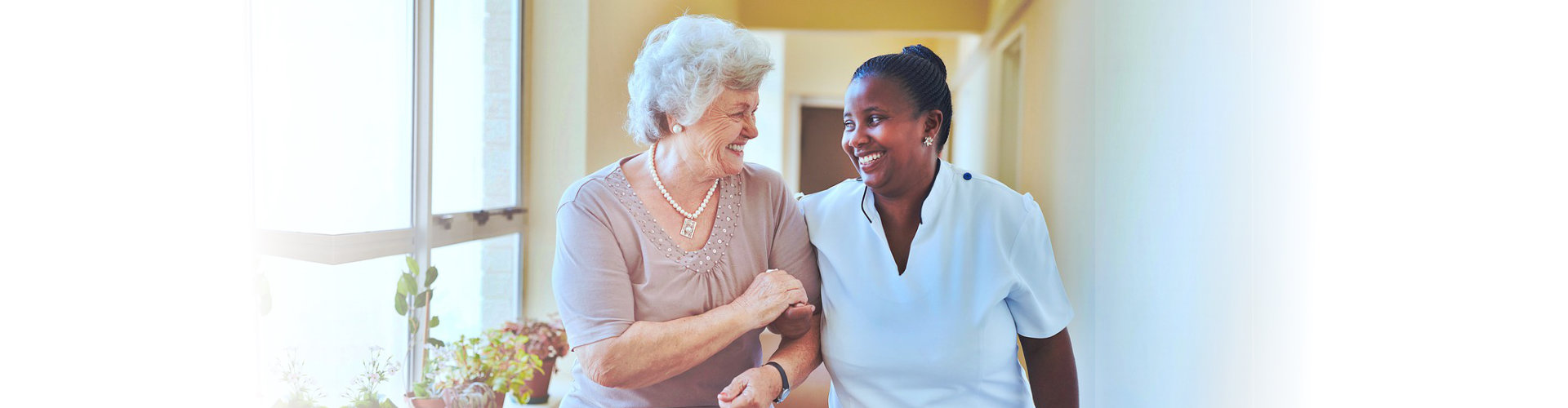 woman and old woman smilling